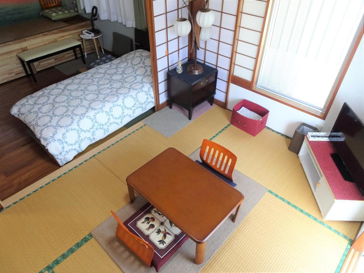 Minshuku Itoman Bettei Goyukkuri Hotel Buitenkant foto