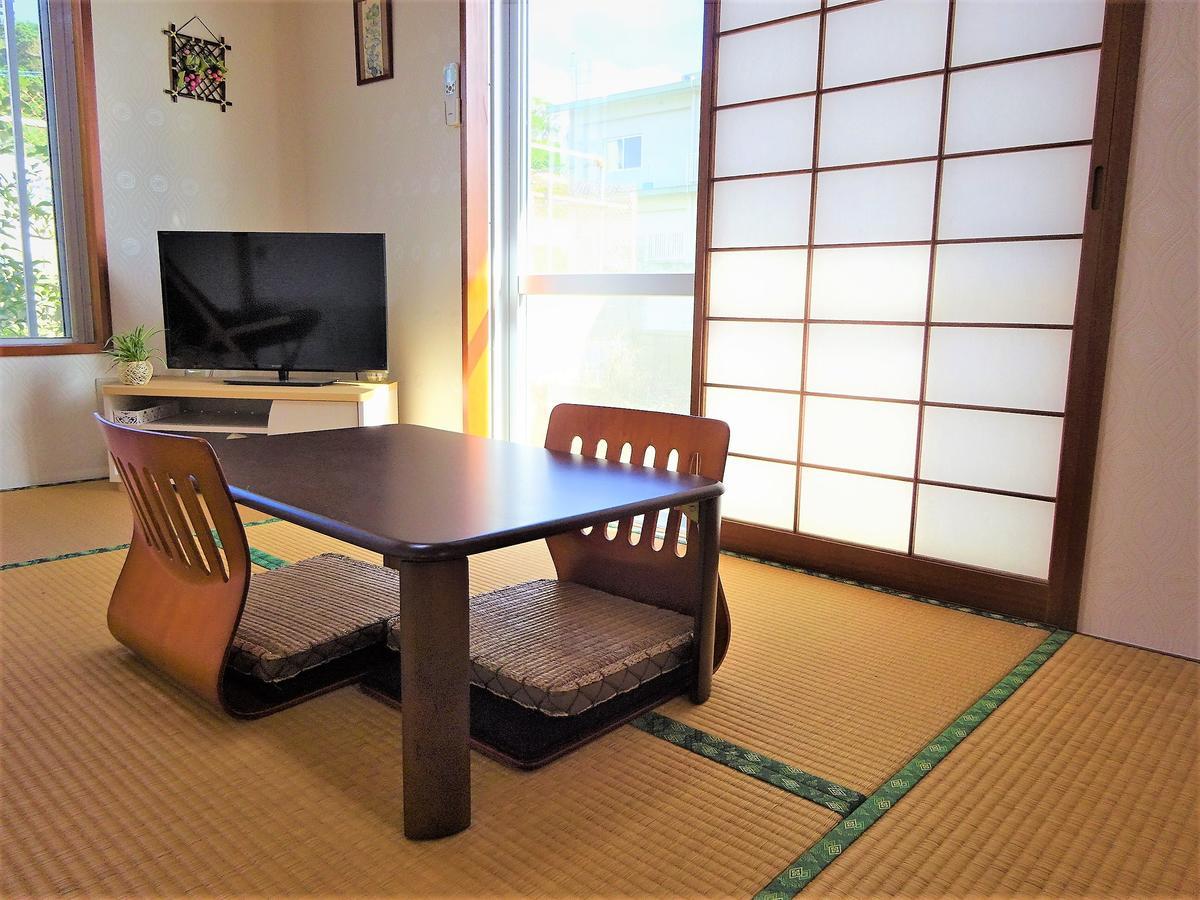 Minshuku Itoman Bettei Goyukkuri Hotel Buitenkant foto